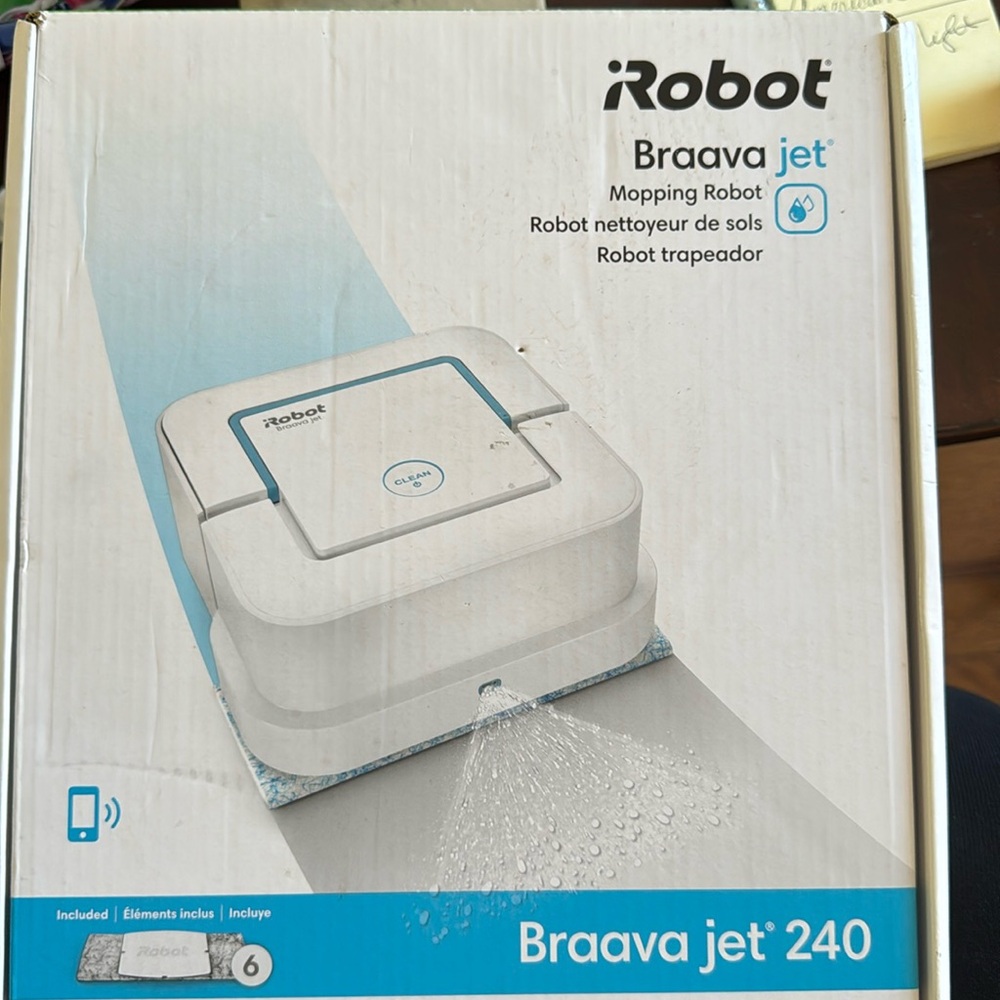 White iRobot Brava Jet 240 mopping robot new in sealed box.